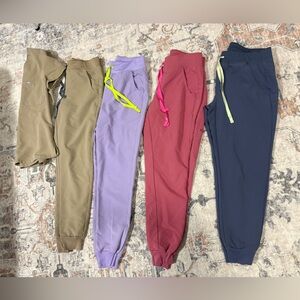 Figs Scrubs  in Navy, Pink, Purple, and Tan